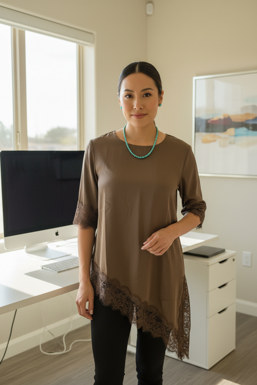 Model with elbow-length sleeves in office